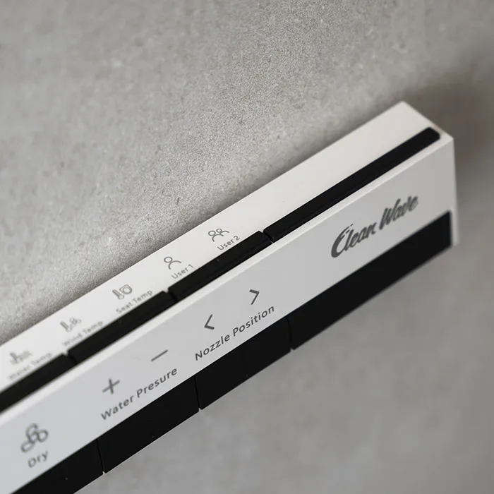 CleanWave remote control with temperature, drying and user profile buttons